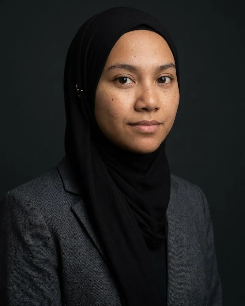 Executive look with a black hijab and charcoal blazer