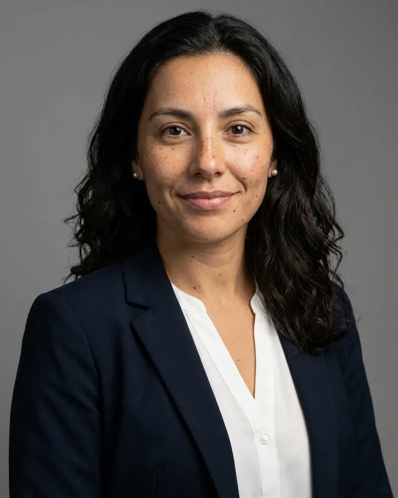 Classic Corporate: navy blazer, white blouse, grey backdrop