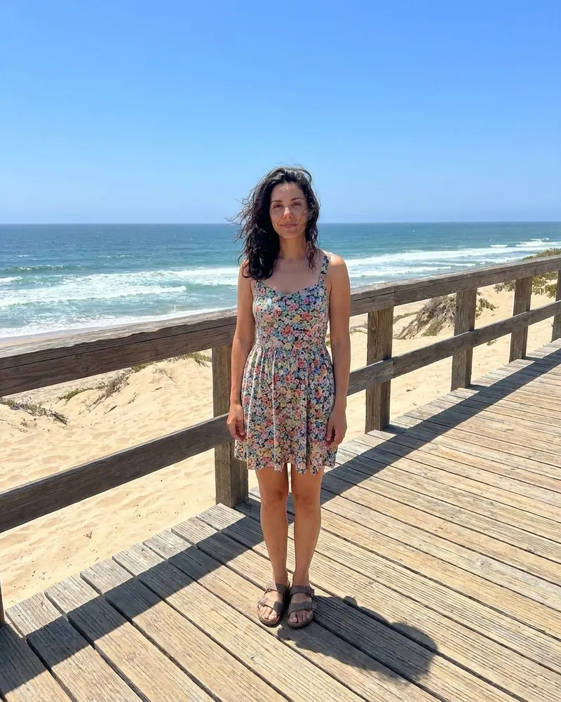 Full length beach photo with a tiny face