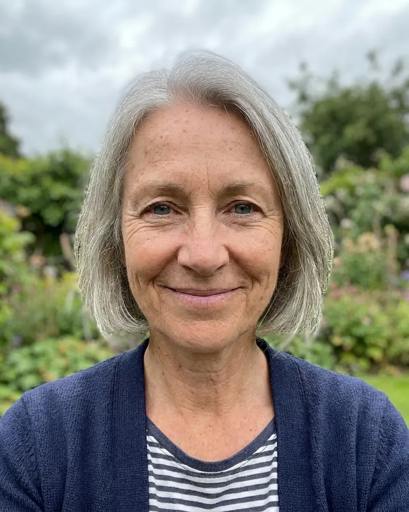 The starting selfie: silver bob, garden, overcast light