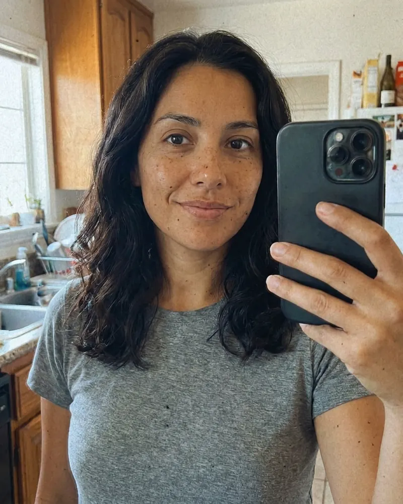 The starting point: one phone selfie in a kitchen